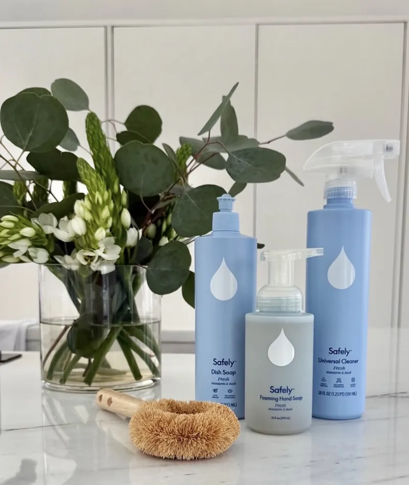 Safely dish soap, foaming hand soap and universal cleaner beside eucalyptus